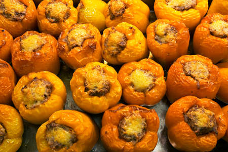 baked peppers stuffed with meat, rice and cheeseの写真素材