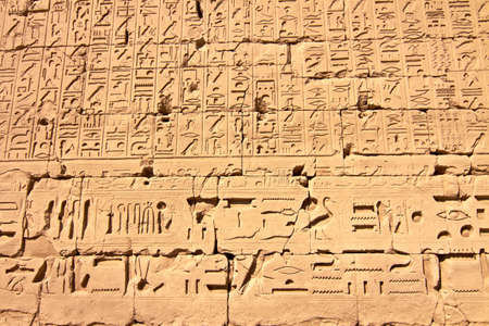 Part of a wall with hieroglyphs as backgroundの写真素材