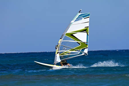 Unidentified man windsurfing in Red Sea waters in Egypt, Safaga, on October 2011の写真素材