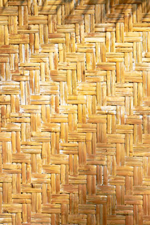 Weaved straws of palm leaves as horizontal backgroundの写真素材