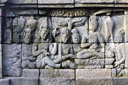 Bass-relief on the wall in Borobudur Buddhist temple, Indonesia, Javaの写真素材
