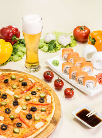 composition of beer sushi  and pizza on white backgroundの写真素材