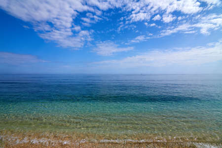 tropical sea and sky with clouds, Gili Meno, Lombok, Indonesia