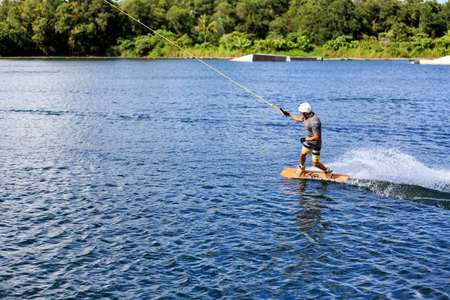 Man Wakeboarding in action. Phuket, Thailandの写真素材