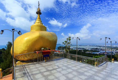 Replica of Phra That In Kwaen (Golden Rock) from Myanmar, Wat Kho Sirey Temple, Phuket, Thailandの写真素材