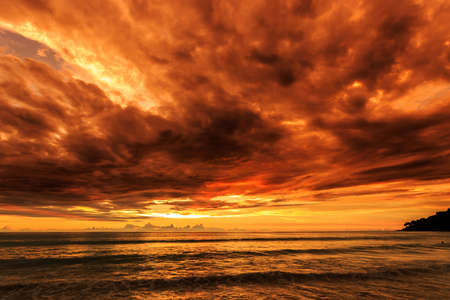 Magic Dramatic Unreal  Sunset in Karon beach, Phuket, Thailandの写真素材