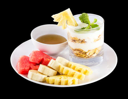 Muesli, fresh fruits and honey isolated on black background. Studio Shoの写真素材