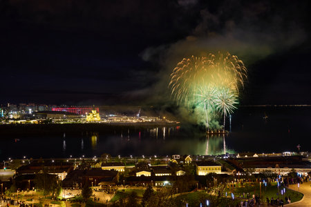 Colorful Fireworks over Strelka in Nizhny Novgorod, featuring illuminated Alexander Nevsky Cathedral.の写真素材
