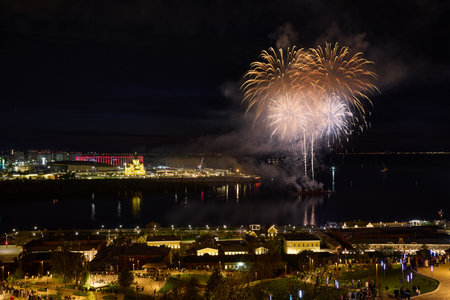 Colorful Fireworks over Strelka in Nizhny Novgorod, featuring illuminated Alexander Nevsky Cathedral.の写真素材
