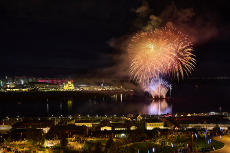 Colorful Fireworks over Strelka in Nizhny Novgorod, featuring illuminated Alexander Nevsky Cathedral.の写真素材