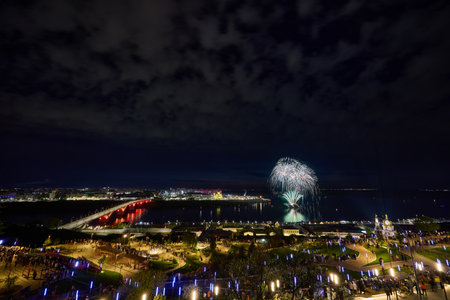 Colorful Fireworks  over Strelka in Nizhny Novgorod, featuring Kanavinsky Bridge and the illuminated Alexander Nevsky Cathedral. 9 Mayの写真素材