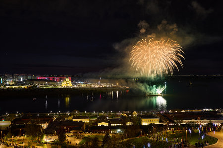 Colorful Fireworks  over Strelka in Nizhny Novgorod, featuring  illuminated Alexander Nevsky Cathedral. 9 Mayの写真素材