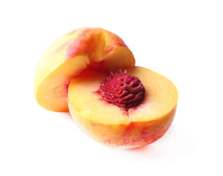 Ripe sweet peaches, isolated on whiteの写真素材