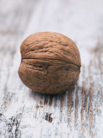 Walnuts on a wooden table.の写真素材