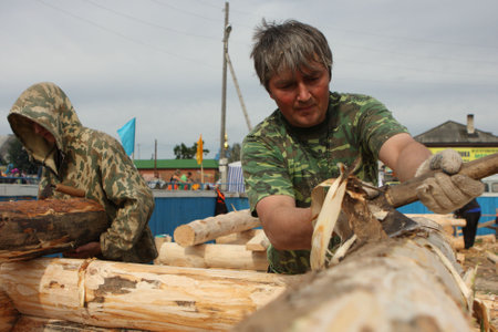 TOMSK, RUSSIA - AUGUST 9: Annual international festival-competition of carpenters - Holiday of Axe, August 9, 2009 in Tomsk, Russia.のeditorial素材