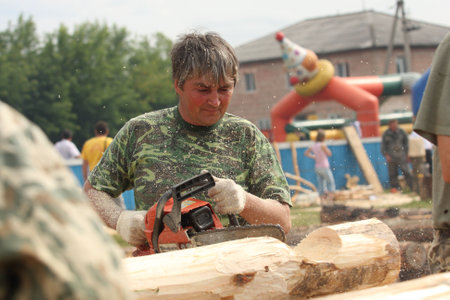 TOMSK, RUSSIA - AUGUST 9: Annual international festival-competition of carpenters - Holiday of Axe, August 9, 2009 in Tomsk, Russia.のeditorial素材