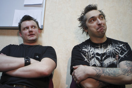 TOMSK, RUSSIA - MARCH 16: Andrei Knyaz Knyazev (L) and Michael Gorshok Gorshenev (R) leaders of russian punk band Korol' i Shut (KiSh) in nightclub Fakel, March 16, 2009 in Tomsk, Russia.のeditorial素材