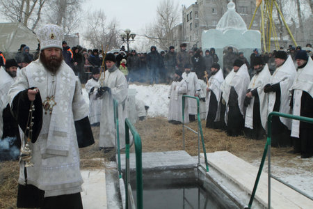 TOMSK, RUSSIA - JANUARY 19: Consecration ice-hole, celebration of Epiphany (Holy Baptism) in the Orthodox tradition, January 19, 2010 in Tomsk, Russia.のeditorial素材