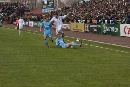 TOMSK, RUSSIA - APRIL 5: Football match Championship of Russia among Tom'(Tomsk) - Zenit (St.Petersburg), April 5, 2009 in Tomsk, Russia.のeditorial素材