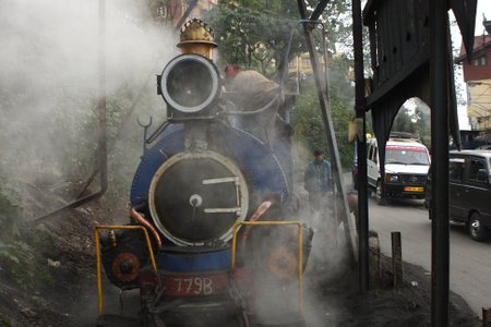 DARJEELING, INDIA - DECEMBER 3: The Darjeeling Himalayan Railway, nicknamed the Toy Train, is a 2 ft...
