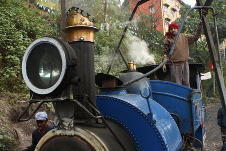 DARJEELING, INDIA - DECEMBER 3: The Darjeeling Himalayan Railway, nicknamed the Toy Train, is a 2 ft (610 mm) narrow-gauge railway from Siliguri to Darjeeling, December 3, 2008 in Darjeeling, India.のeditorial素材