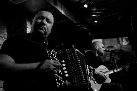 TOMSK, RUSSIA - MARCH 4: Musician, songwriter, radio broadcaster and founder and leader of the Va-Bank Alexander F. Sklyar in club Underground, March 4, 2009 in Tomsk, Russia.のeditorial素材