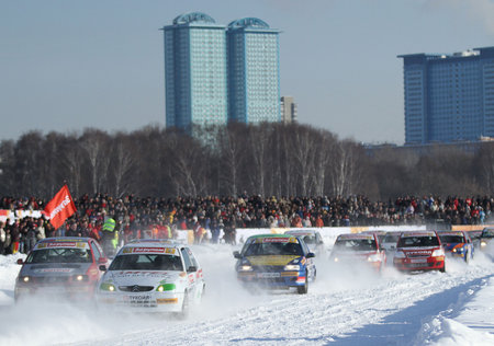 MOSCOW, RUSSIA - FEBRUARY 23: 21st traditional "Race Stars"Za rulyom" on the ice road in Tushino (racing drivers: David Coulthard, Vitaly Petrov, Firdaus Kabirov), February 23, 2010 in Moscow, Russia.のeditorial素材