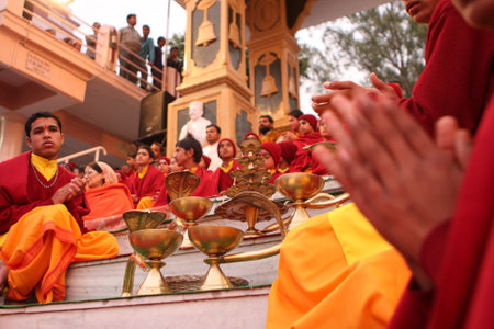 RISHIKESH, INDIA - JANUARY 19: Hindu students from the Parmath Niketan Ashram hold ceremonial lanterns during the daily aarti prayer on the River Ganges, January 19, 2009 in Rishikesh, India.のeditorial素材