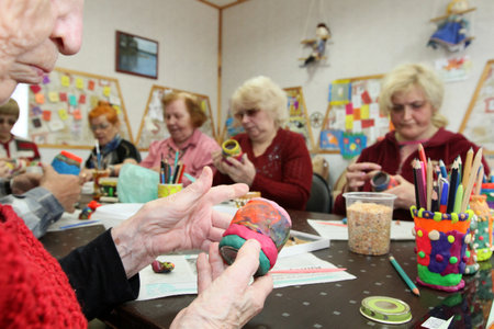 PODPOROZHYE, RUSSIA - JUNE 4: Day of Health in Center of social services for pensioners and the disabled Otrada (occupational therapy for eldery), June 4, 2010 in Podporozhye, Russia.のeditorial素材