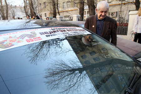 Action Give us a lift Veteran of the Moscow Government and the Youth Union of motorists, streetracers bused free veterans to various activities, April 14, 2010 in Moscow, Russia.のeditorial素材