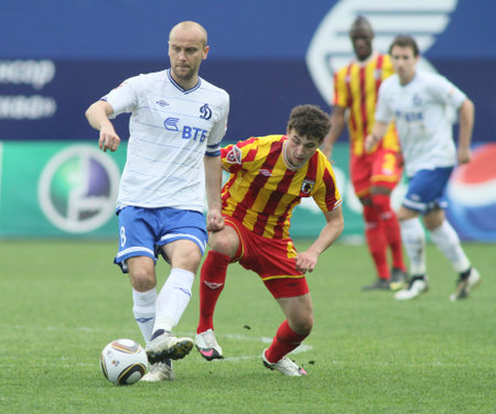 MOSCOW - MAY 15: Dinamo's midfielder Dmitry Hohlov (L) in a game of the 11th round of Russian Football Premier League - Dinamo Moscow vs. Alania Vladikavkaz - 2:0, May 15, 2010 in Moscow, Russia.のeditorial素材
