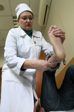 MOSCOW - JUNE 18: Conscripts from the Moscow region undergoing a medical examination at the recruitment center, June 18, 2010 in Moscow, Russia.のeditorial素材