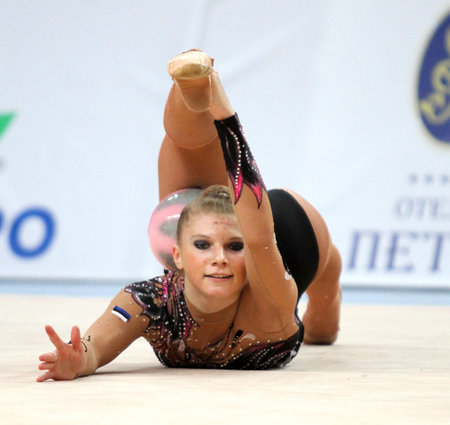 MOSCOW - FEBRUARY 20: An unidentified participant in action at International Tournament in Rhythmic Gymnastics Grand Prix Cup champions Gazprom, February 20, 2010 in Moscow, Russia.のeditorial素材