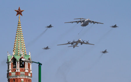 MOSCOW - MAY 9: Strategic supersonic bombers fly over Red Square during the Military Parade dedicated to the 65th anniversary of the Victory in the Great Patriotic War, May 9, 2010 in Moscow, Russia.のeditorial素材