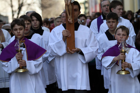 MOSCOW, RUSSIA - MARCH 25: Catholics walk in a procession held ahead of the Easter Holy Week,...