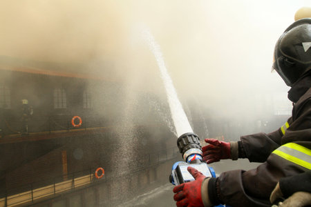 MOSCOW - APRIL 30: Firefighters extinguishing fire at the Viking floating restaurant on the...