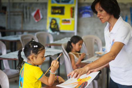 Pupil in a learning session during lesson drawing in primary school for poor, February 8, 2011 in Guayaquil, Ecuador.のeditorial素材