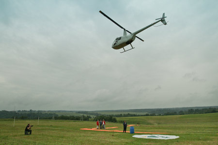 Yakhroma, Russia, June 25, 2011 - Carlson Cup-2011 Competitions on helicopter sports on the Robinson R44, in the First Helicopter Club Aerosoyuz in Moscow region.のeditorial素材