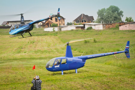 Yakhroma, Russia, June 25, 2011 - Carlson Cup-2011 Competitions on helicopter sports on the Robinson R44, in the First Helicopter Club Aerosoyuz in Moscow region.のeditorial素材