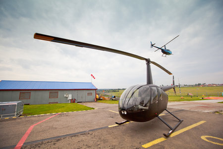 Yakhroma, Russia, June 25, 2011 - Carlson Cup-2011 Competitions on helicopter sports on the Robinson R44, in the First Helicopter Club Aerosoyuz in Moscow region.のeditorial素材