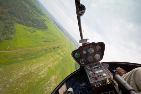 Yakhroma, Russia, June 25, 2011 - Carlson Cup-2011 Competitions on helicopter sports on the Robinson R44, in the First Helicopter Club Aerosoyuz in Moscow region.のeditorial素材