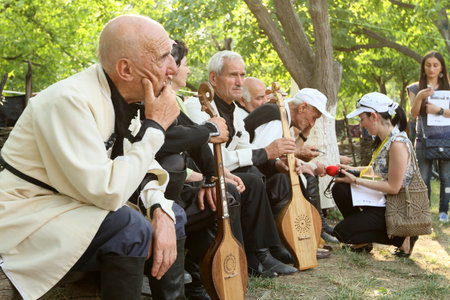 TBILISI, GEORGIA - JULY 17: Participants in Georgian Folk Art Gene Festival, traditionally festival starts in regions of Georgia and continues in Ethnographic Museum, July 17, 2011 in Tbilisi, Georgia.のeditorial素材