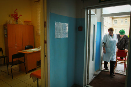 VINNICY, RUSSIA - SEPTEMBER 23: Activities to International Day of Older Persons: poor man, a client Center of social services for pensioners, transported to the hospital, September 23, 2011 in Vinnicy, Russia. のeditorial素材