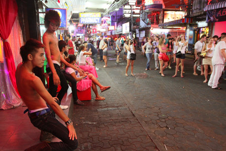 PATTAYA, THAILAND - NOVEMBER 27: Nightlife on Walking Street, commonly known as a place that offers plenty of sexual entertainment, mainly for men, November 27, 2011 in Pattaya, Thailand.  のeditorial素材