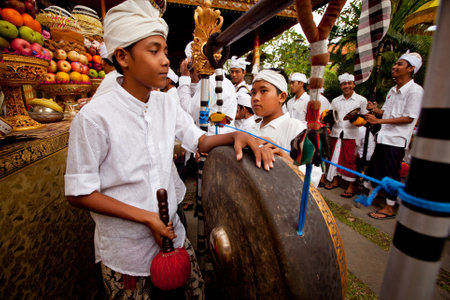 Melasti Ritual is performed before Nyepi - a Balinese Day of Silence that is commemorated every year (in 2012, it is on March 23rd) on March 18, 2012 in Ubud, Bali, Indonesia.のeditorial素材