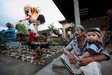 UBUD, BALI - MARCH 22: Unidentified child during the celebration of Nyepi - Balinese Day of Silence on March 22, 2012 in Ubud, Bali, Indonesia. The day following Nyepi is also celebrated as New year.のeditorial素材