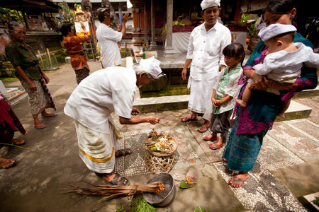 BALI, INDONESIA - MARCH 28: Unidentified child during the ceremonies of Oton - is the first ceremony...