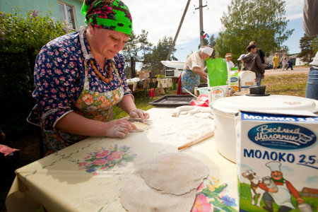 VINNICI, LENINGRAD REGION, RUSSIA - JUNE 10: Local people during celebrate the annual holiday Vepsian national culture Tree of Life (vepssk.Elo-pu), June 10, 2012 in the village Vinnici, Russia.のeditorial素材