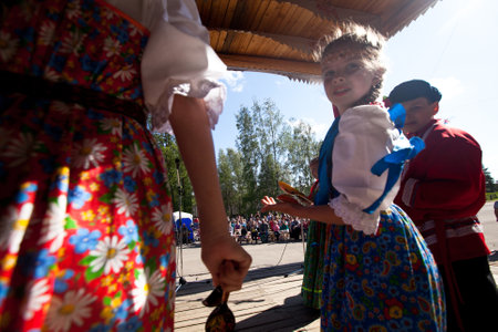 VINNICI, LENINGRAD REGION, RUSSIA - JUNE 10: Local people during celebrate the annual holiday Vepsian national culture Tree of Life (vepssk.Elo-pu), June 10, 2012 in the village Vinnici, Russia.のeditorial素材