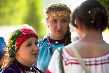 VINNICI, LENINGRAD REGION, RUSSIA - JUNE 10: Local people during celebrate the annual holiday Vepsian national culture Tree of Life (vepssk.Elo-pu), June 10, 2012 in the village Vinnici, Russia.のeditorial素材